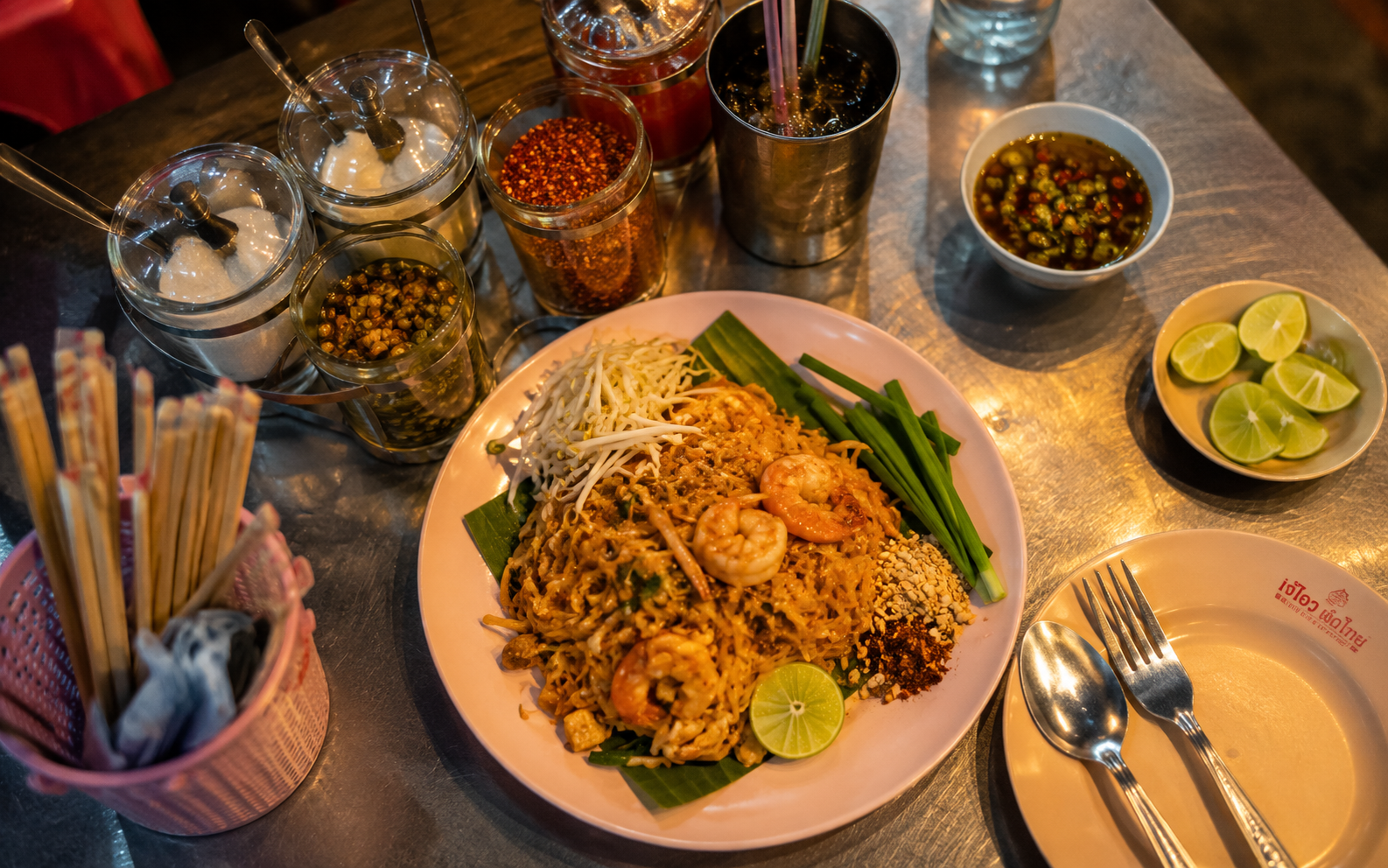 Thai street food stall with noodles